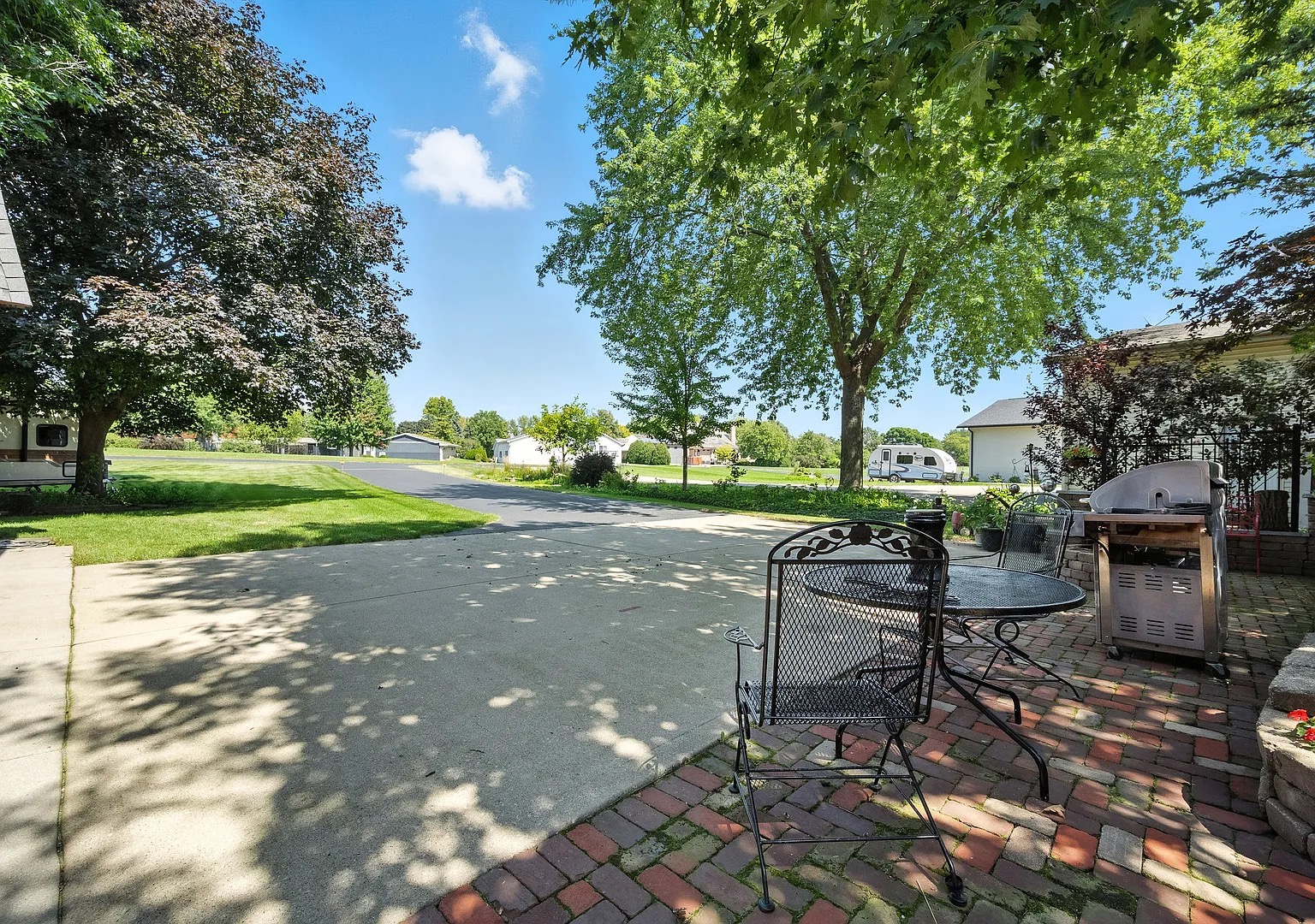 Back patio with BBQ facing the taxiway