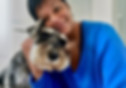Cute dog being lovingly cared for by owner