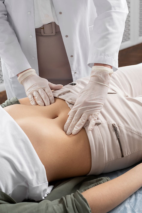 high-angle-doctor-checking-patient.jpg