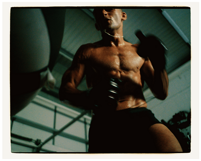 Boxer training on a punch bag at Traphouse Boxing Gym in Folkestone
