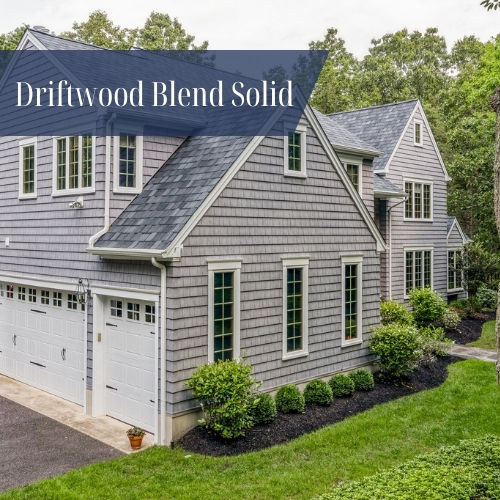 Driftwood Blend solid vinyl siding installed on a New England home, neutral siding color option