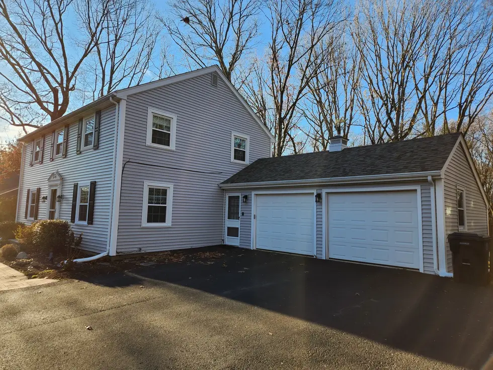 Driftwood vinyl siding install on home in North Kingstown, Rhode Island.