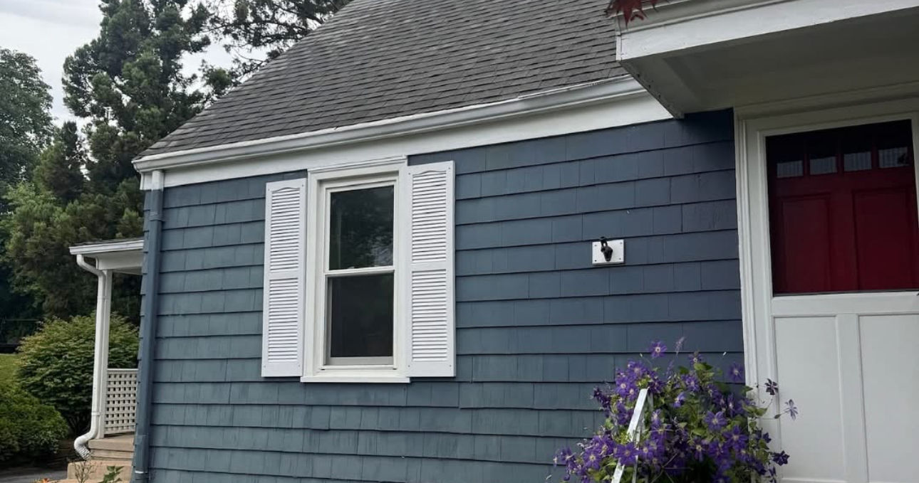 Before roof replacement in Warwick, Rhode Island showing aging asphalt shingles