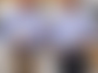 Two men walking through a warehouse