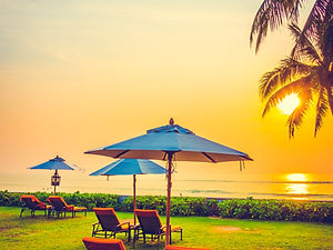 white-chair-dinner-parasol-wedding.jpg