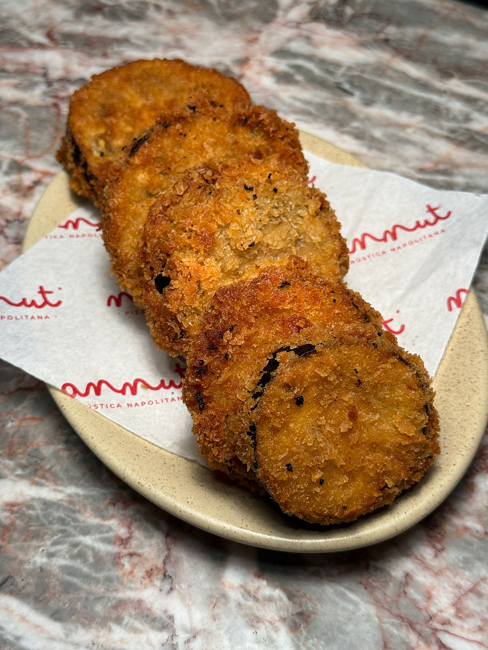 Berenjena frita y miel picante | $155