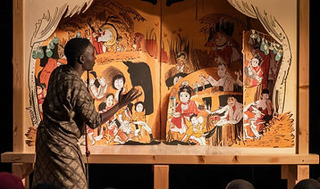 a-captivating-photo-of-a-storyteller-in-africa-usi-tGJTMoYJSkK-boQhiDDj9Q-nYEo5uGVS8moZOOk