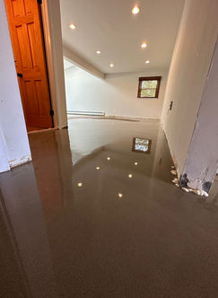 Smoothing uneven floor with self-leveling compound application