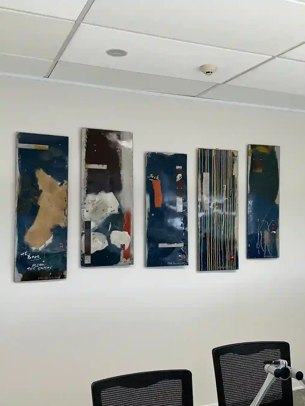 Metal Artworks in an Offset Grid in Boardroom