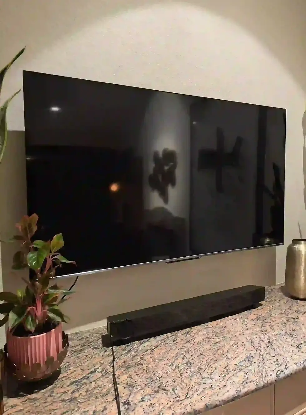 TV Wall Mounted on Concrete Wall
