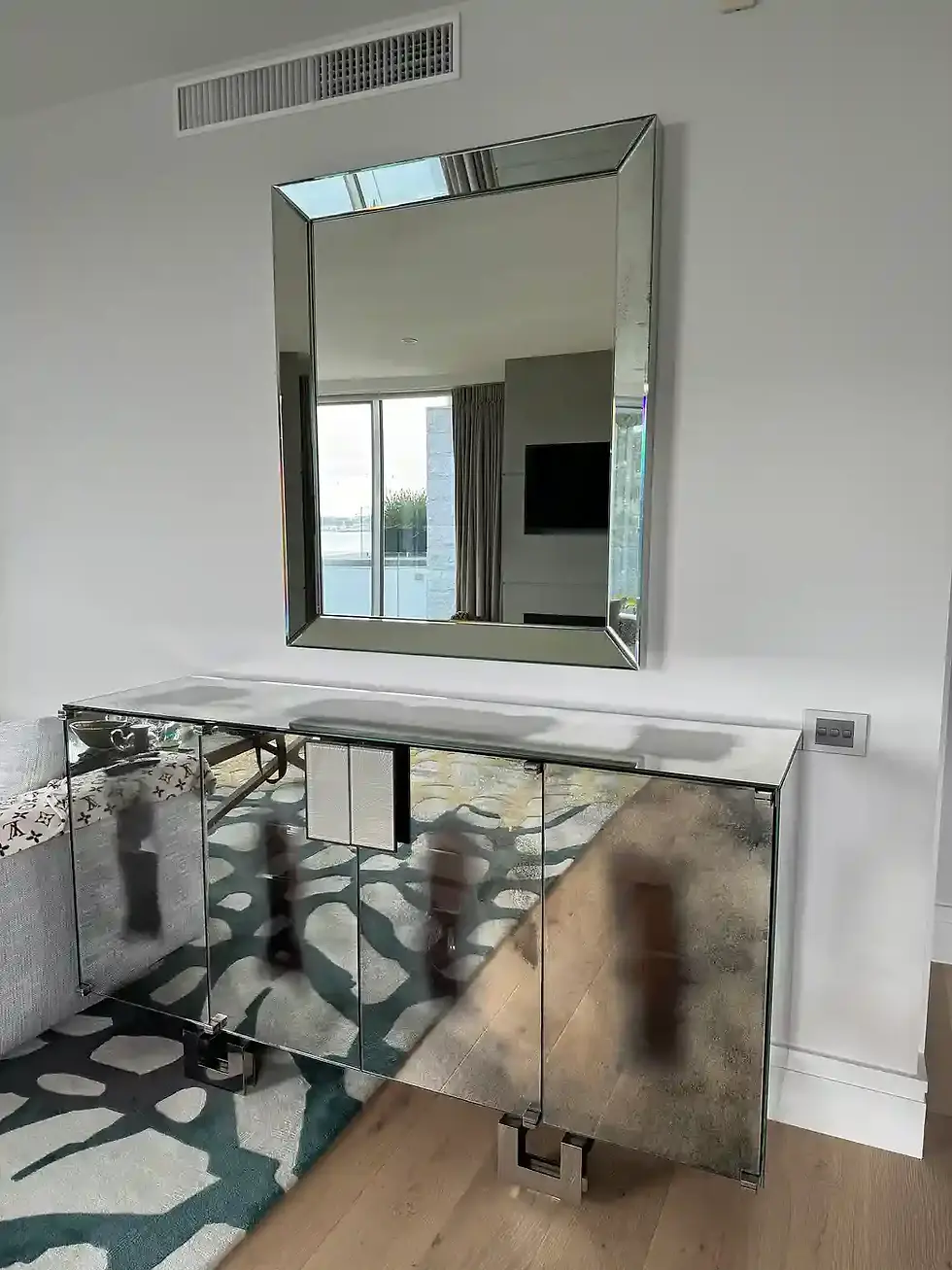 Mirror Above Cabinet