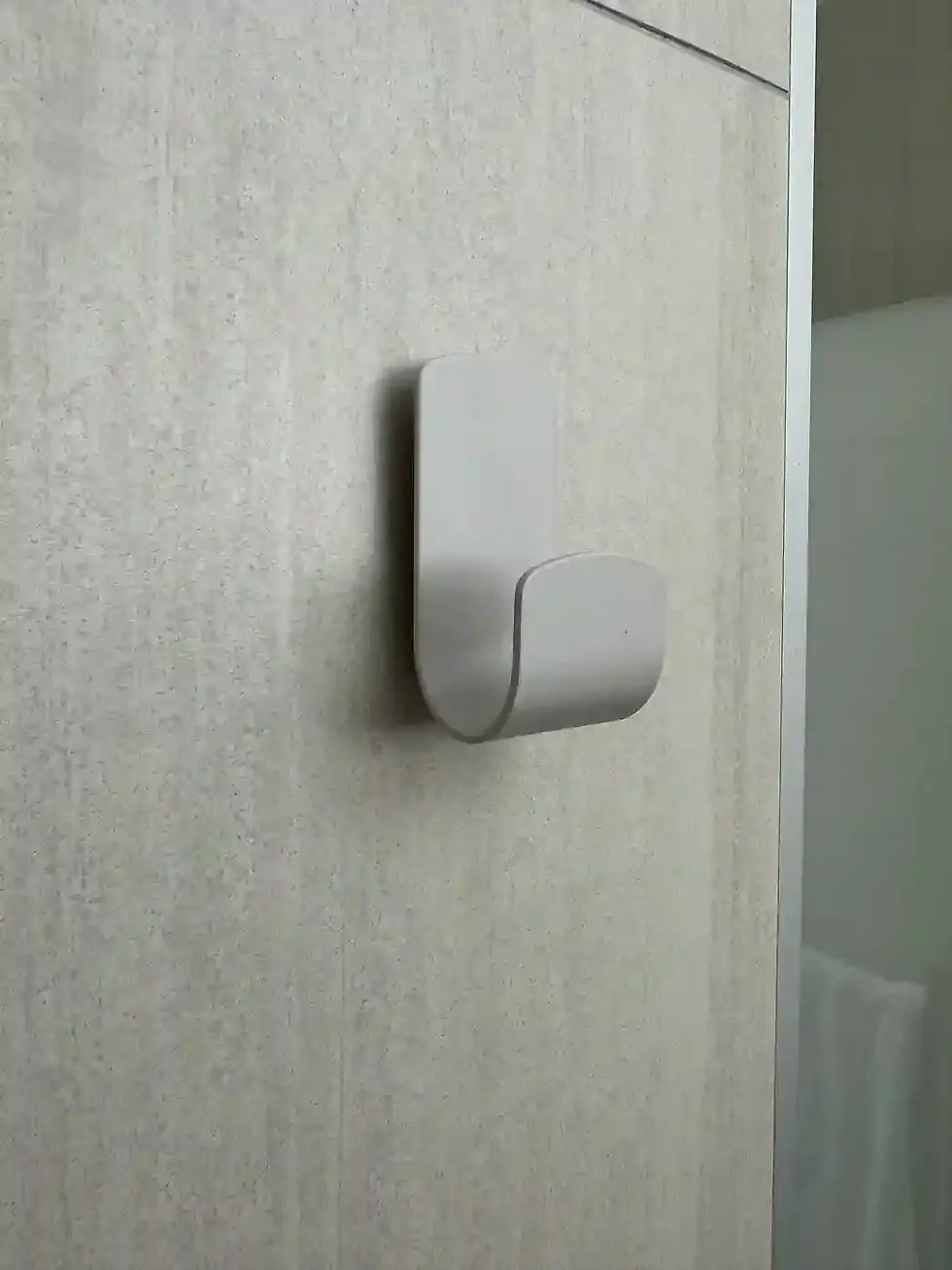 Clothing Hook in Bathroom on Ceramic Tile