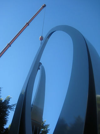 Craning in abstract sculpture by sculptor Roger Assi. Public sculpture commission on behalf of ISPT in Mascot Sydney