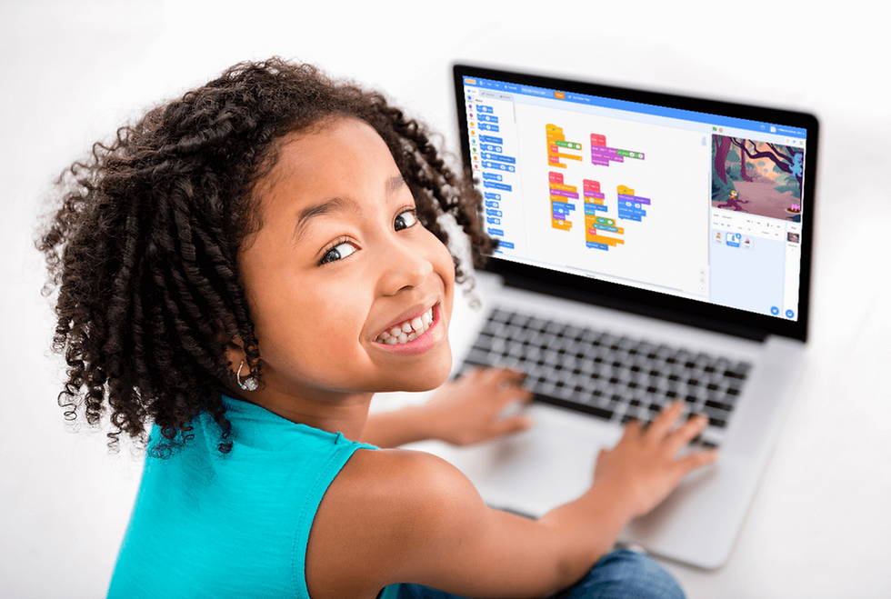 a young 10 year old child using scratch to code