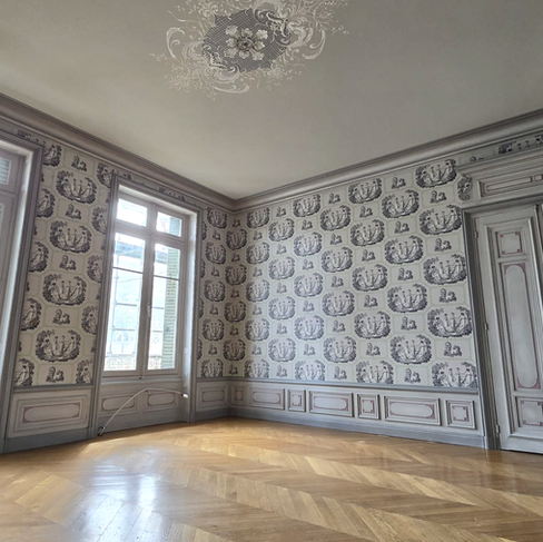 The room freshly painted and installed with Colin Maillard wallpaper