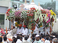 Procession with flowers and people. गंगा दशहर पूजा-विधि दशहर आरंभ Ganga Dussehra Gangavataran religious event. PANDITJIPUNE
