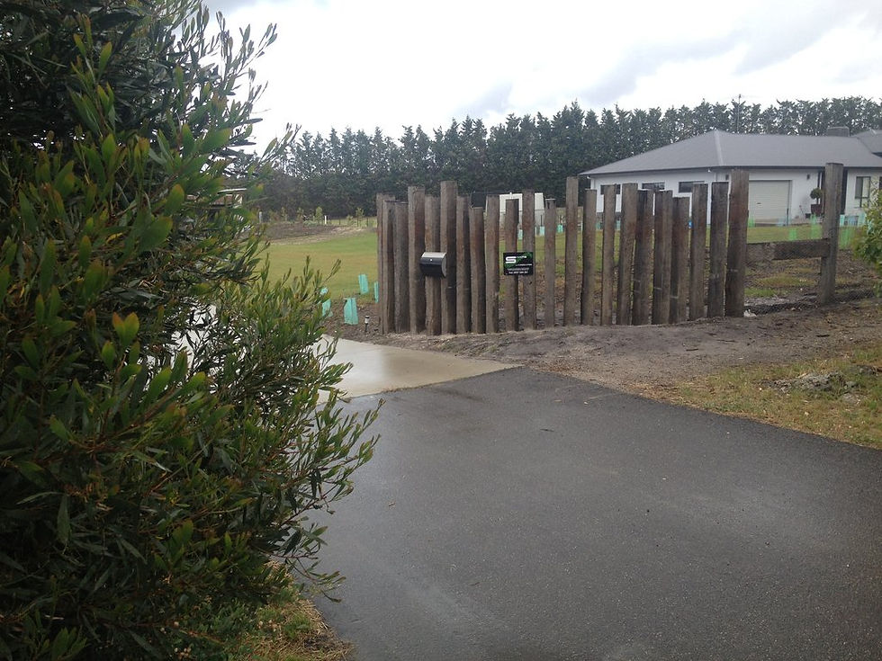 Timber feature fence, with an automated farm gate with solar: Greater City Fencing