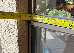 Tape measure on a window