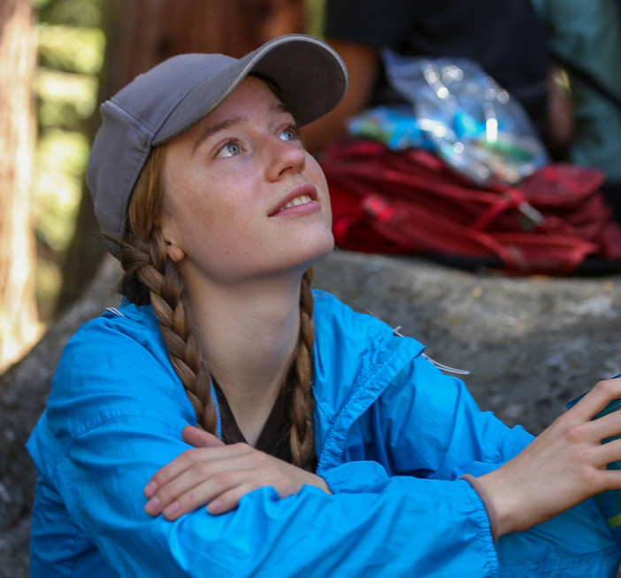 High school student looking up during an outdoor activity