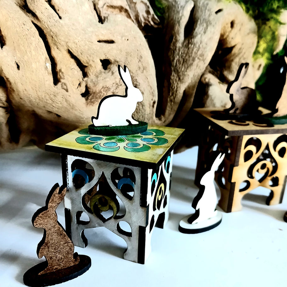 Miniature laser engraved side tables and rabbits