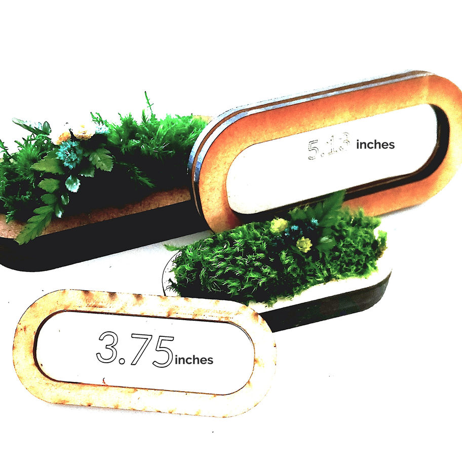 Miniature preserved moss filled wooden dough bowl trays