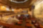 Multi-level restaurant or event venue with dining areas.