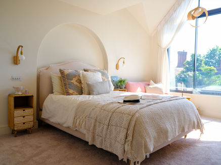 Warm Minimalism Vaulted Bedroom