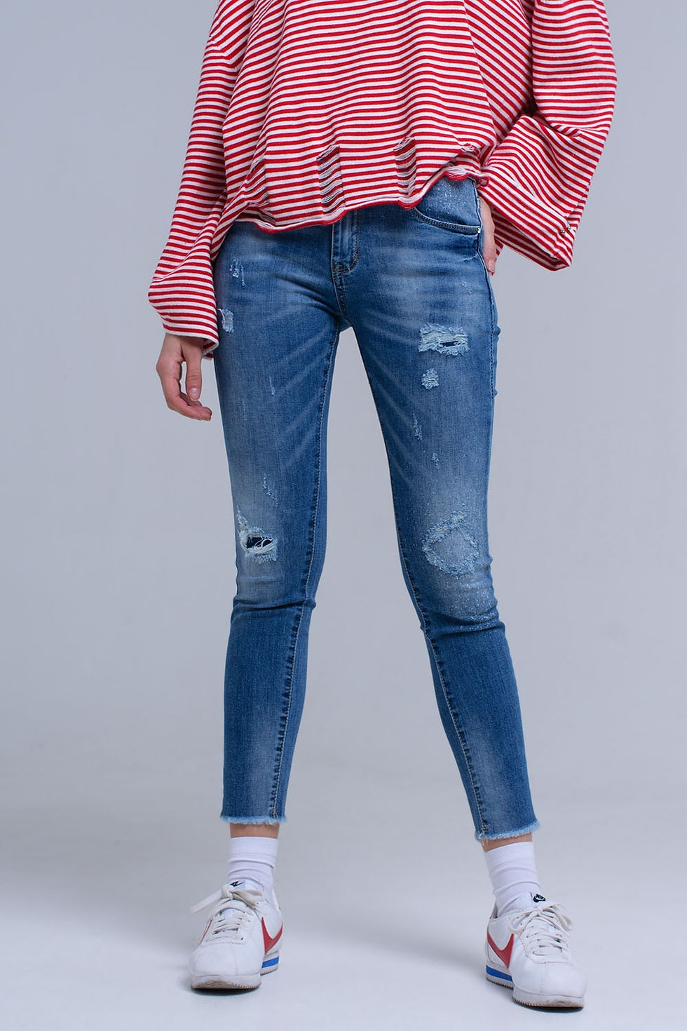 Thumbnail: Women's Distressed Skinny Jeans With Fringe Hem