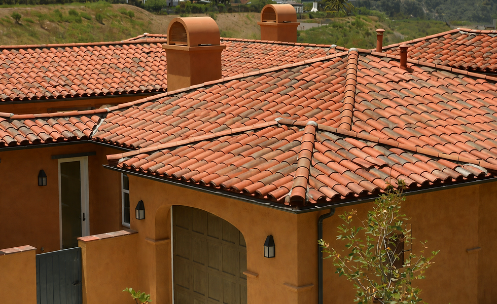 Spanish-style terracotta tile roofing on a Tucson home, highlighting professional residential roof installation built for Arizona desert climates.