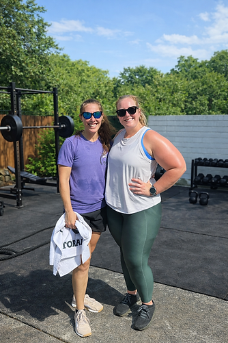 Outdoor gym buddies posing together.png