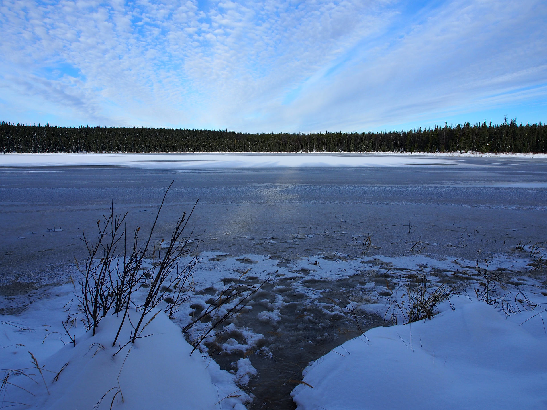 Frozen lake at the Pink Mountains