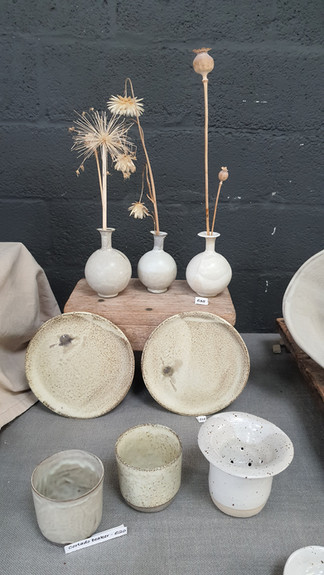 pottery plates, cups and vases