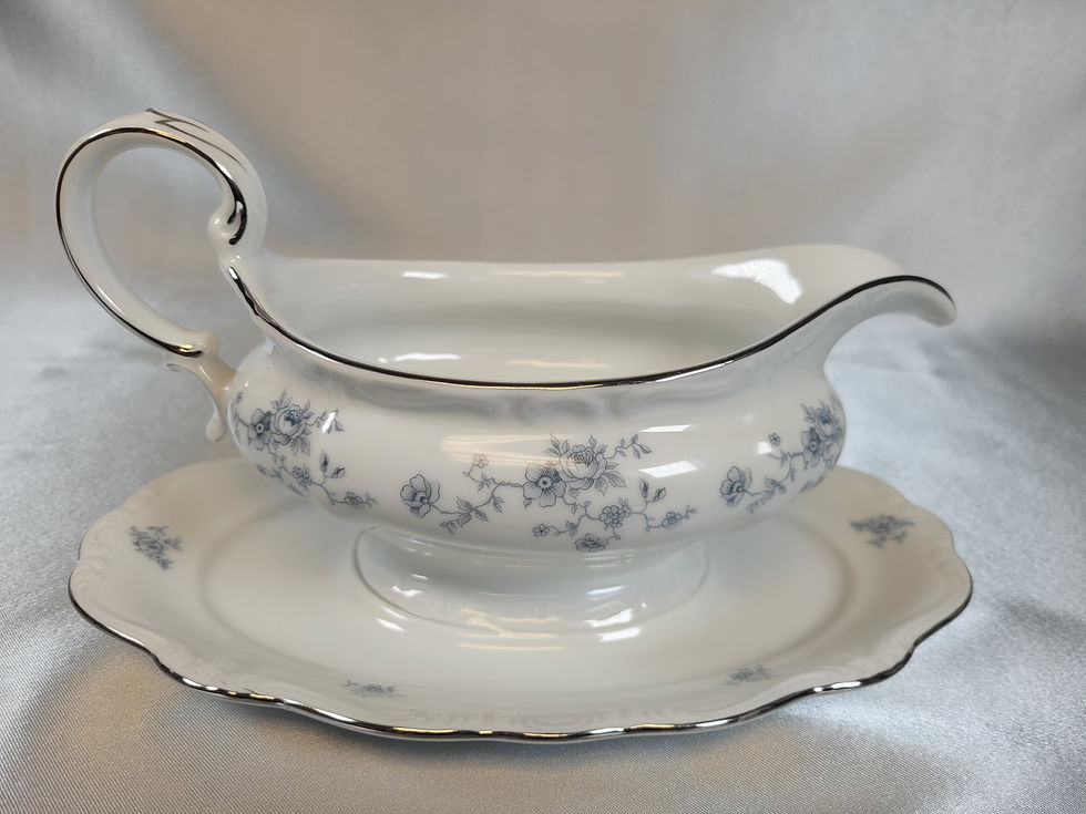 White China gravy boat with blue flowers
