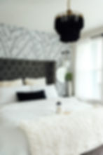 bright airy black and white modern bedroom