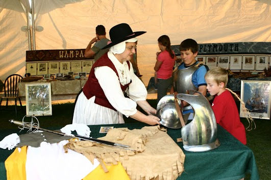 Sara with boys at exhibits