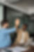 two-young-men-celebrating-success-in-modern-office-2026-01-08-00-17-09-utc.jpg