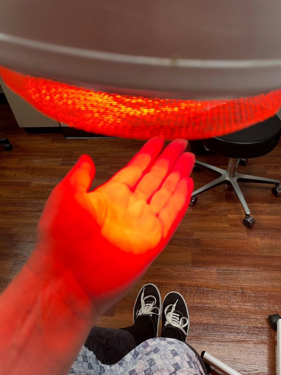 hand under a warmer