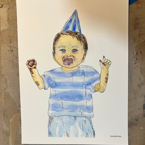 Portrait of a toddler on his birthday with eating cake with a party hat on