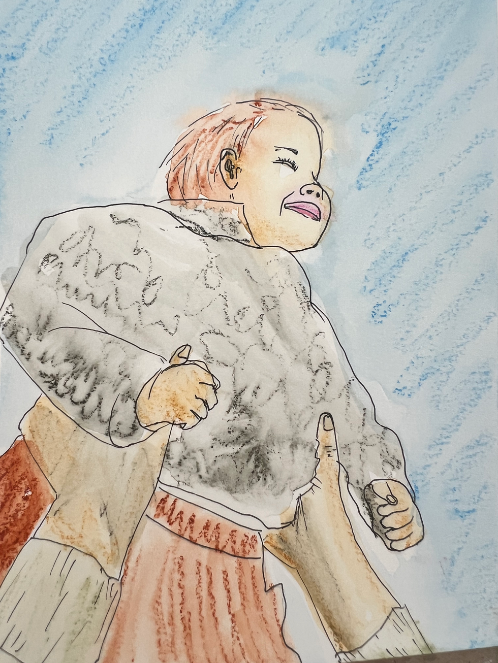 Portrait of a little boy being held in the air with a joyful expression