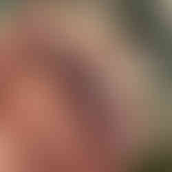 Dramatic black glitter nails with a glossy finish, perfect for a bold and glamorous holiday look.