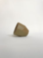 side view of ocre ceramic cup