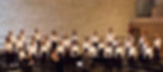 a performance by choir, piano, and oboe.