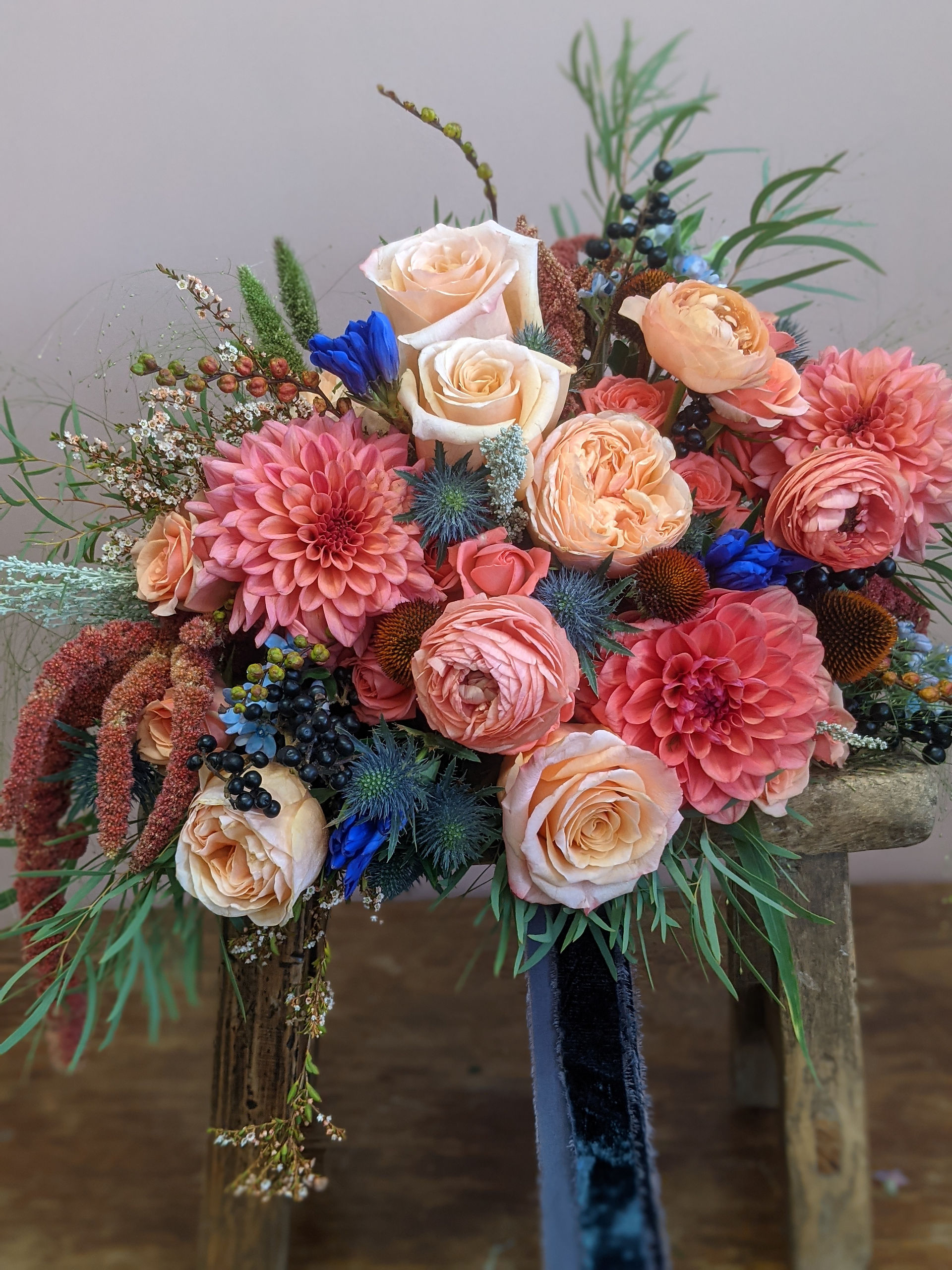 flower colour inspiration using peach fuzz, vibrant corals and electic blue tones
