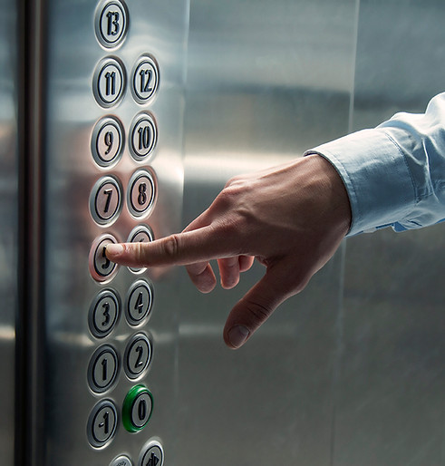 Pressing Elevator Button