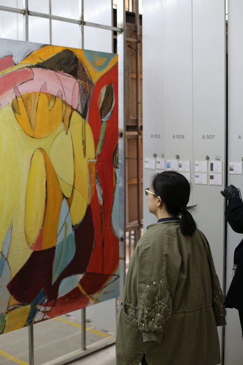 Lulu viewing Monique's artwork at Being 3 Gallery