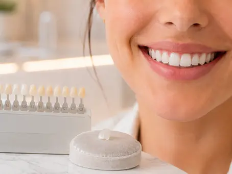 A professional high-end studio photograph featuring a beautiful, close-up shot of a person's mouth with a bright, natural, and healthy smile.