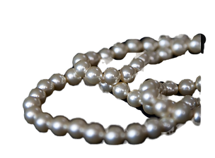 mask and pearls_edited_edited.png