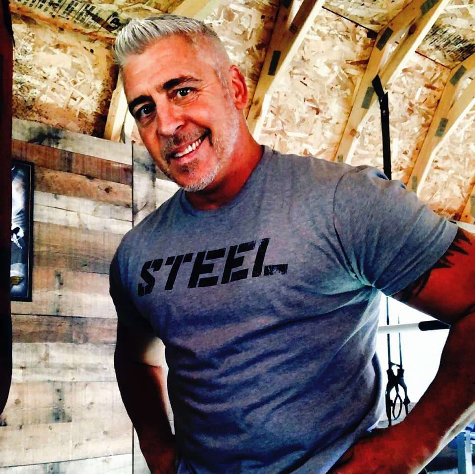 Eye-level view of a personal trainer guiding a client during a workout