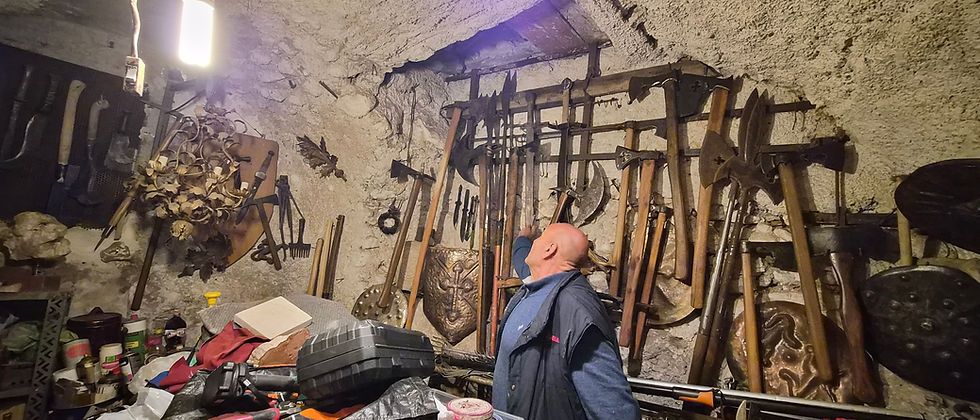 Carpe gladio! Seize the sword! We happened upon this blacksmith in the medieval town of Sermoneta on my birthday as we wandered down a street and stopped to admire his hand-carved walking sticks for sale. Fortunately, he noticed us as well and came out to chat. It turns out that Dino Messini is a Jack-of-All-Trades, a rare breed of human beings in our technological age. Dino creates historical weapons for the annual reenactment of the Battle of Lepanto that Sermoneta puts on every October. Also a keeper of bees, we purchased several large jars of Dino's delicious orange blossom honey extracted from the surrounding countryside. Dino is a living history book whose passion for his town and its past has not dimmed with time. We were fortunate to stumble upon his walking sticks so that he could pass the torch of history on to us, and then send us home with a renewed appreciation for the importance of keeping historical methods of arts, crafts, and agriculture alive, even in an age of convenience and efficiency.