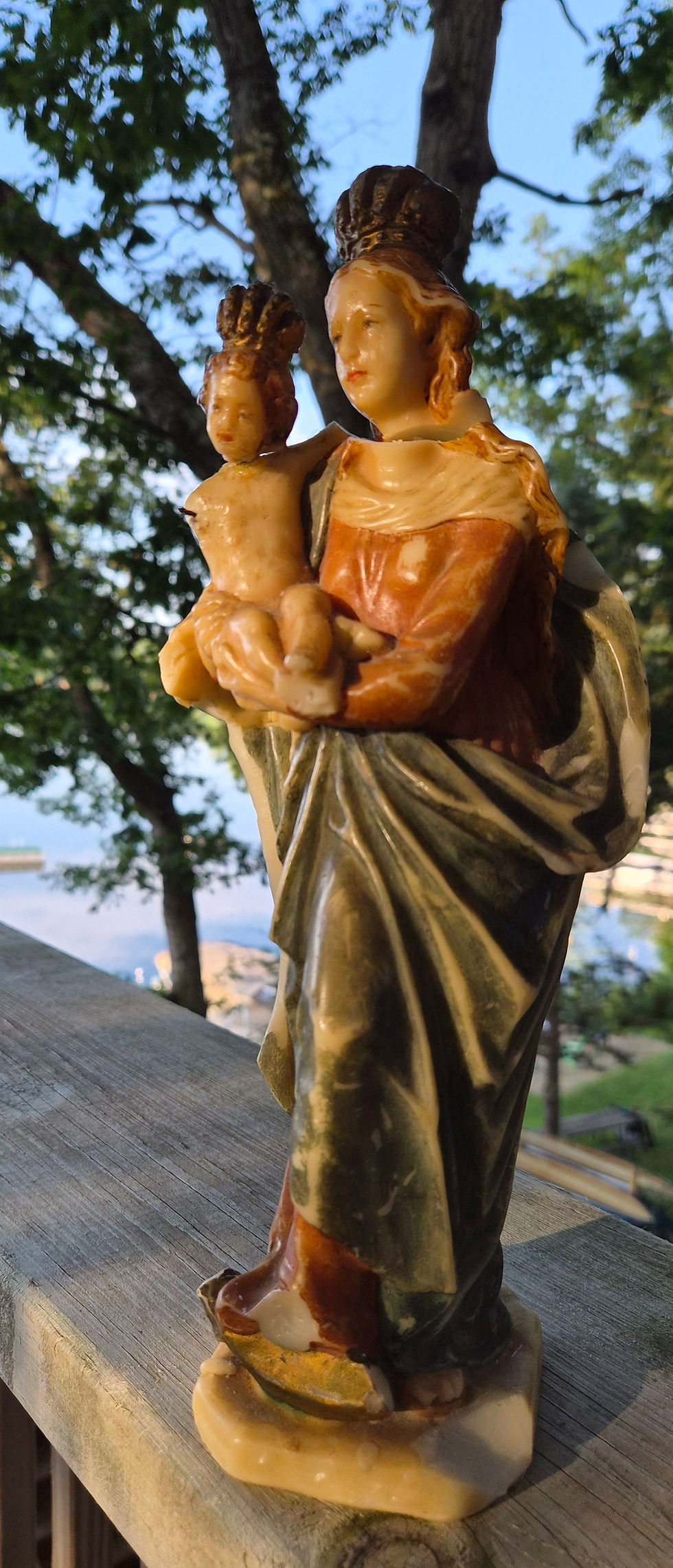 Buona Festa! This regal mother and child wax scuplture is older than I am and has been carted around by me from place to place my whole adult life. Surprisingly, it is still in one piece. Yesterday I visited a local candle making shop, which gave me the idea to feature this wax work of art for today's feast of the Queenship of Mary. Here, she and her Prince of Peace are being greeted by the rising sun, upon whom they smile. Today, Pope Leo has asked the whole world to fast and pray for an end to conflict and war. Regina della Pace, prega per noi!